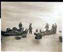 Image of Two teams at rest. 5 men standing